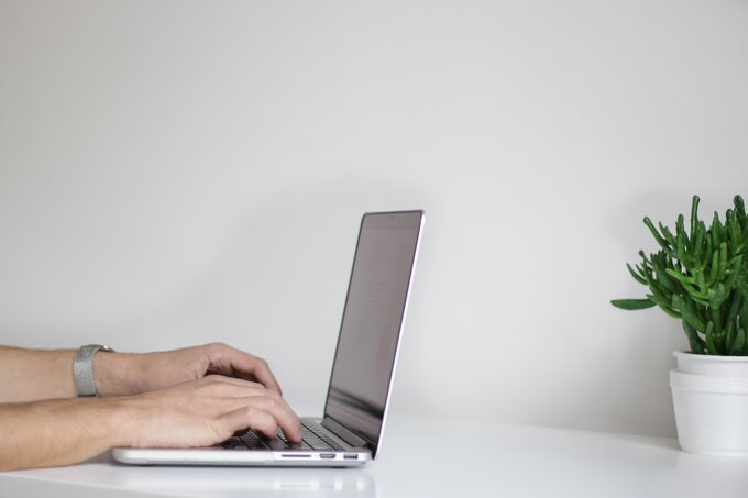 A Man working on a laptop
