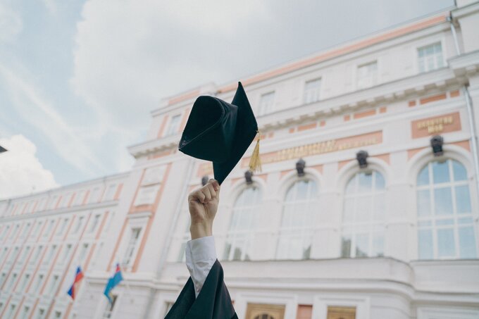 Promtion hat being thrown